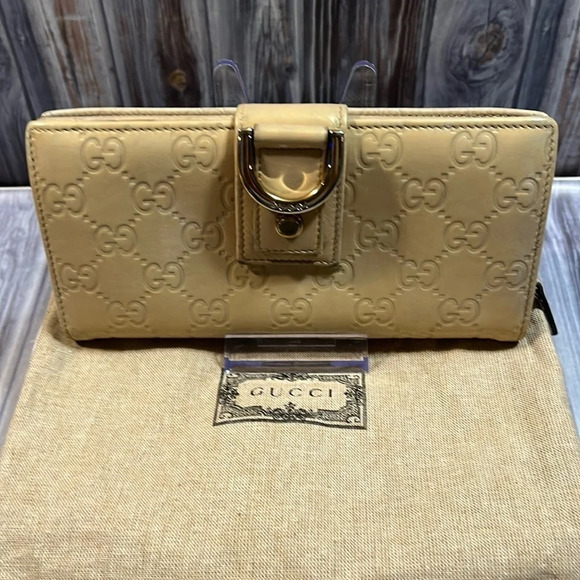 GUCCI CREAM LEATHER BIFOLD ZIP WALLET WITH SIGNATURE HORSE BIT CLASP. - Picture 1 of 16